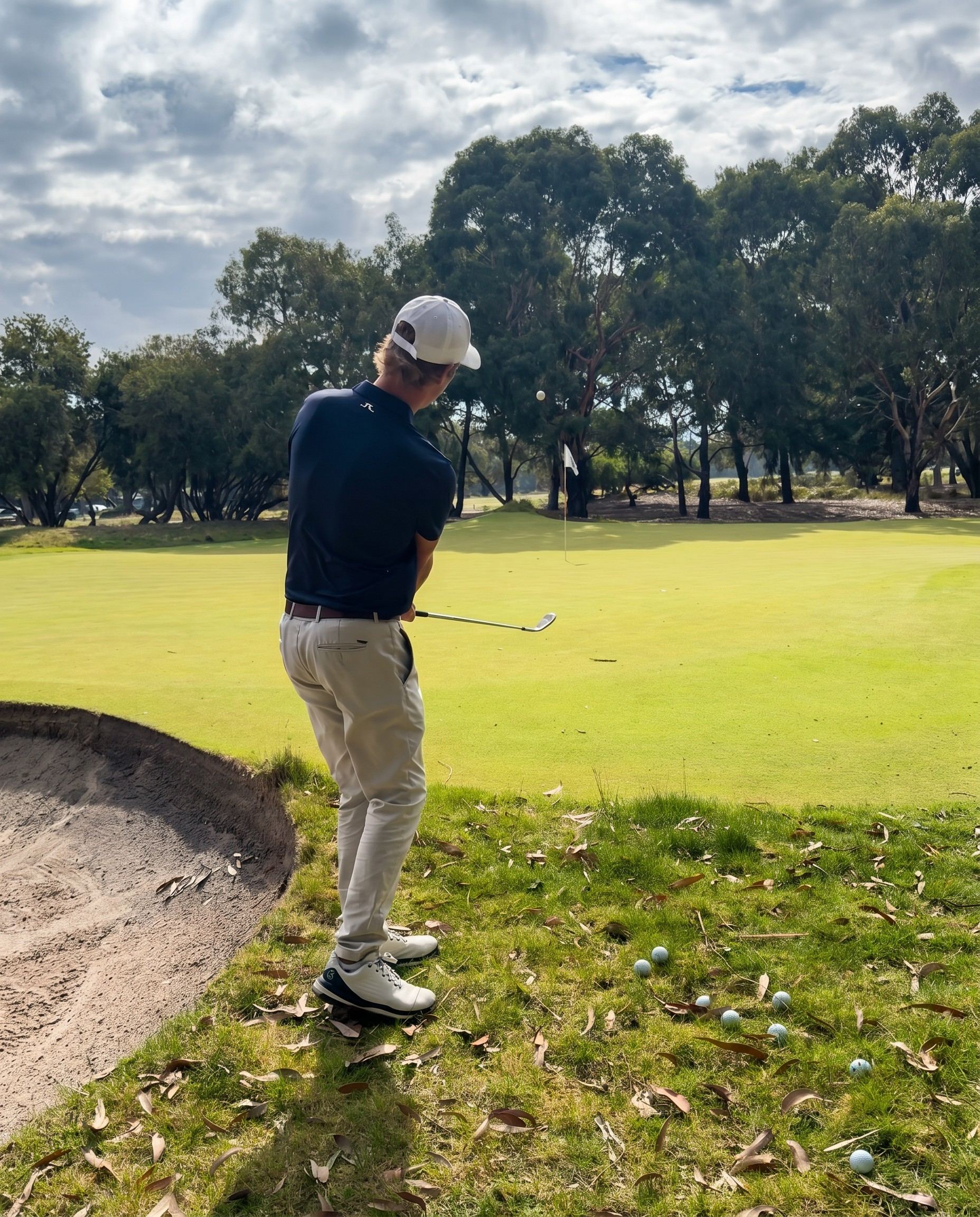 Andrew Cooper chipping beside a bunker